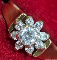 Close-up of flower cluster showing central and surrounding CZ stones