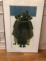 Framed pastel painting showing three stylized figures in dark cloaks against blue and white background