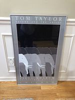 Framed poster showing three stylized elephants with text 'Tom Taylor Nature and the Artist Field Museum Of Natural History Chicago'
