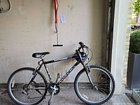 Side view of Norco Katmandu 20 inch mountain bike showing frame, tires, handlebar, and saddle