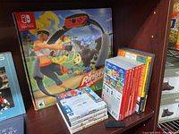 View of Ring Fit Adventure box and stacked game cases