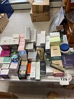 Overview of multiple boxed skincare products grouped on table