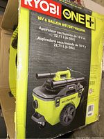 Box showing Ryobi 18V ONE+ 6 gallon wet/dry vacuum branding and image.