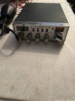 Front view of Cobra 25LTD Classic CB radio transceiver showing controls and microphone.