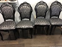 Front view of all four chairs in a row