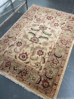 Full front view of carpet showing overall design and condition