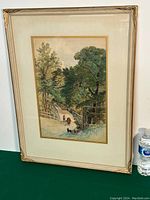 Full view of the framed painting showing the artwork under glass with matting and frame detail.