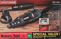 Photo of Craftsman rotary tool and flexible shaft attachment with carrying case and accessories displayed on a wooden surface.