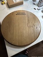 Top view showing the round wooden lazy Susan with "Sonoma Zinfandel" stamped text.