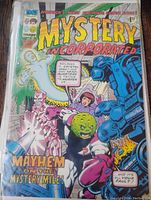 Front cover of vintage Mystery Incorporated comic book showing main characters and title.