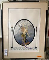 Full front view of framed serigraph including mat and painted wood frame