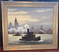 Front view of framed oil painting showing tugboat on the water with city skyline in background and artist's signature lower left