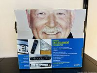 Box back showing product features and benefits including 500+ channel capacity, parental controls, electronic programming guide, and pay-per-view.