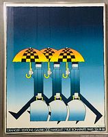 Serigraph print showing three stylized figures holding yellow and black checkered umbrellas and shovels, signed by Michel Granger, with gallery information on print border.