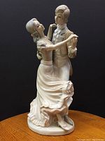 Front view of vintage TENGRA Spain porcelain dancing couple figurine showing detailed craftsmanship and posture.