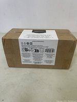 Sealed cardboard box with Amazon Basics label indicating pre-sharpened wood-cased #2 HB pencils, 150 pack