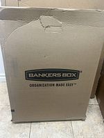 Photo of the Bankers Box cardboard box showing front branding and slogan 'Organization Made Easy'.