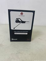 Front side of the product box showing the YouthWhisper bone conduction headphones image and Bluetooth logo.