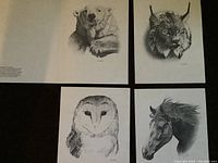 Four black and white wildlife animal prints showing polar bear, lynx, barn owl, and horse, along with artist's introductory sheet.