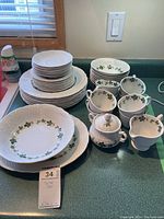 Overview of full dinnerware set on countertop