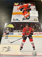 Photo of Brent Seabrook signed 8x10 photo showing player on ice in Blackhawks uniform and autograph card, with COA