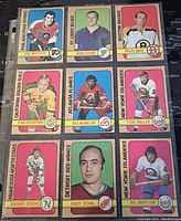 Front of 9 assorted 1972-3 O-Pee-Chee NHL hockey trading cards featuring players from multiple teams.