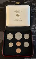 1973 Canadian Uncirculated Coin Set displayed inside Royal Canadian Mint case with 7 coins arranged neatly