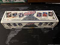 Top view of the 1991 Upper Deck complete baseball card set box with player images and text showing 3D team holograms and baseball cards