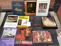 Photo of 10 art and drawing books arranged on a surface showing titles and covers