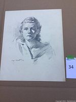 Charcoal portrait of a woman signed by Sergei Bongart, dated 1949