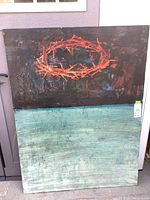 Full view of the unsigned modern painting on board showing the abstract design with dark upper section and turquoise lower section, featuring a prominent orange-red circular pattern in the center.