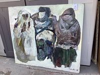 Front view of large canvas board painting with three abstract human figures in muted colors