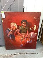 Three elderly women painted on board with red background, showing wear and paint loss.