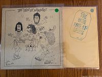 Front covers of "The Who by Numbers" and "Live at Leeds" albums