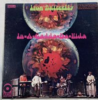 Front cover of the vinyl LP showing the band Iron Butterfly with psychedelic hourglass artwork and album title.
