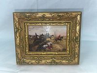 Frontal view of the hunting scene oil painting with ornate gold frame showing the full scene and frame details.