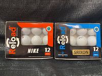 Two unopened packs of golf balls, one Nike and one Srixon, in Reload brand boxes.