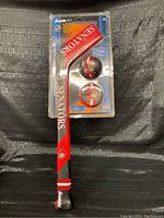 Photo of entire set sealed in plastic blister packaging, clear view of stick and two soft balls