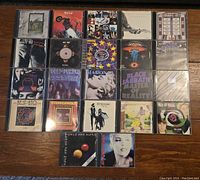 Full front view of all 22 CDs, showing album artwork and layout