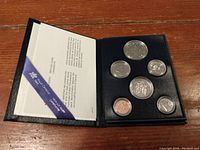 Photo of the complete 1983 Canadian uncirculated coin set in protective case with certificate