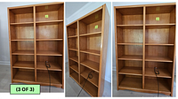 Front and angled views of one oak bookshelf section showing four adjustable shelves, medium oak finish, clean lines, and rectangular silhouette.