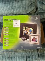 Front and back of unopened box featuring product images and specifications