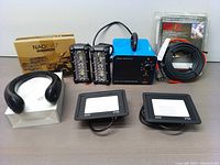 Full view of bundle showing ozone generator, LED lights, heat-it cable, and NAOEVO LED light bar with boxes and packaging