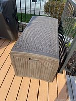 Front and top view of closed deck box on deck