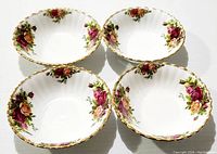 Set of four Royal Albert Old Country Roses bone china fruit/dessert sauce bowls showing fluted edges and floral pattern.