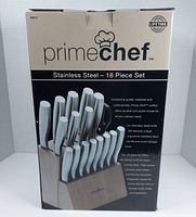 Front of the Prime Chef 18-piece stainless steel cutting tool set packaging showing the knives in the block and product information