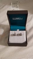 Effy 925 sterling silver stud earrings displayed in their original box with blue interior lining and Effy logo on the lid.