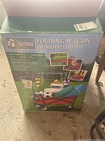 Box of the Seina folding wagon showing the product image and basic features.