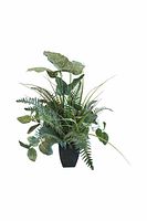 Mixed faux greenery arrangement featuring speckled variegated leaves, ferns, and grass-like stems in a black tapered vase