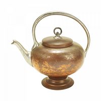 Copper kettle with rounded bulbous base, silver-tone spout and handle, hinged lid with loop knob.